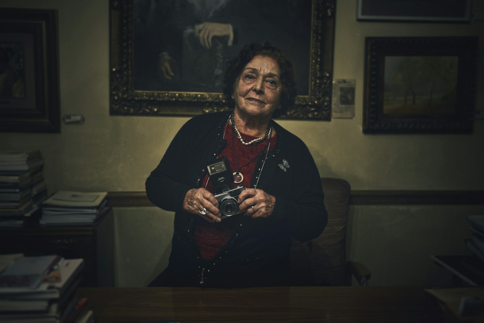 A woman in her sixties laughing during a portrait session